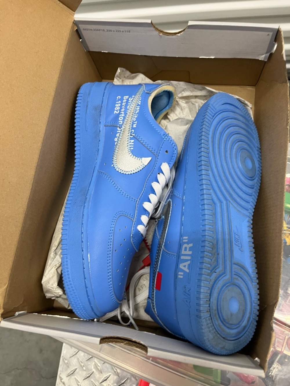 Nike Blue Low-Top Sneakers with White Swoosh